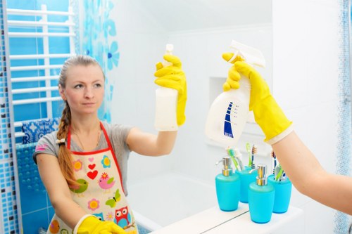 Professional oven cleaner restoring a kitchen oven in a local home