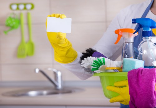 Professional cleaning company team maintaining a modern office space