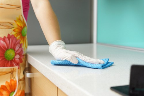 Sofa cleaning services restoring a fabric sofa in a bright living room