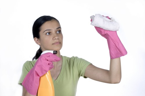 House clearance team sorting items for removal during a local service