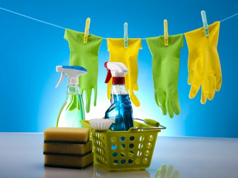 Residential cleaning service staff deep cleaning a kitchen